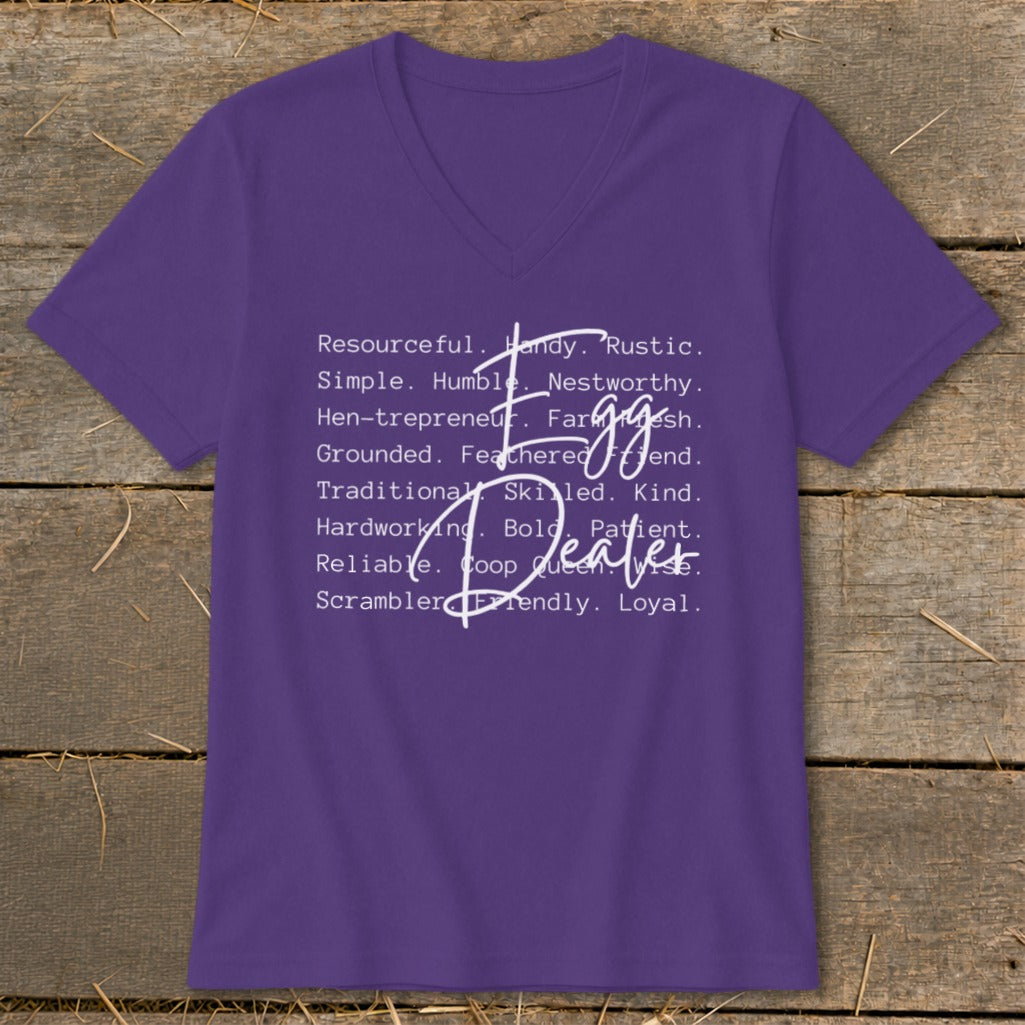 Purple v-neck t-shirt with "Egg Dealer" and descriptive words.