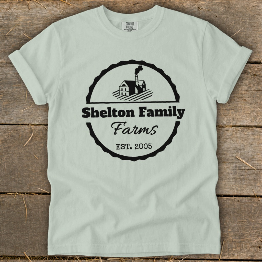 Light green t-shirt with black Shelton Family Farms logo and Est. 2005.