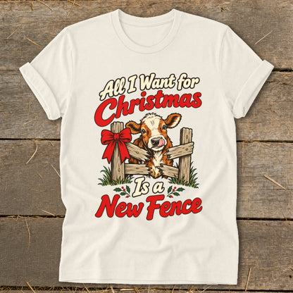 Cow in fence with text "All I Want for Christmas Is a New Fence".
