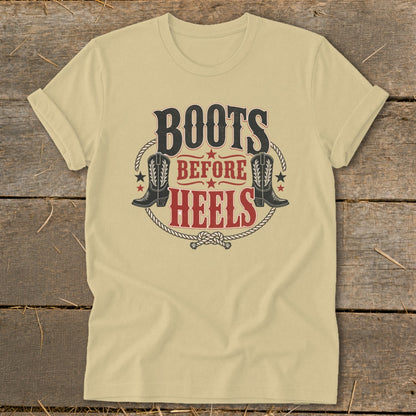 Light yellow t-shirt with "BOOTS BEFORE HEELS" text and cowboy boots graphic.