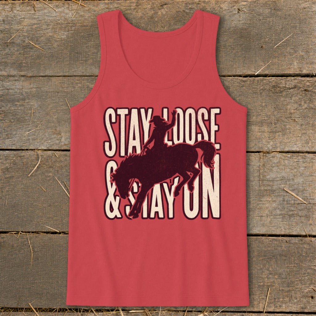 Red tank top with distressed "STAY LOOSE & STAY ON" text and bronc rider graphic.