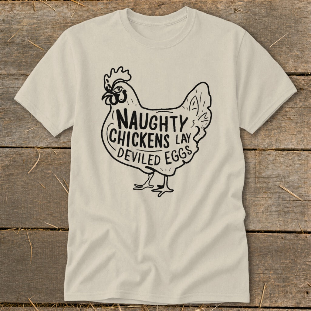 Cream t-shirt with black graphic of a chicken and text "Naughty Chickens Lay Deviled Eggs".