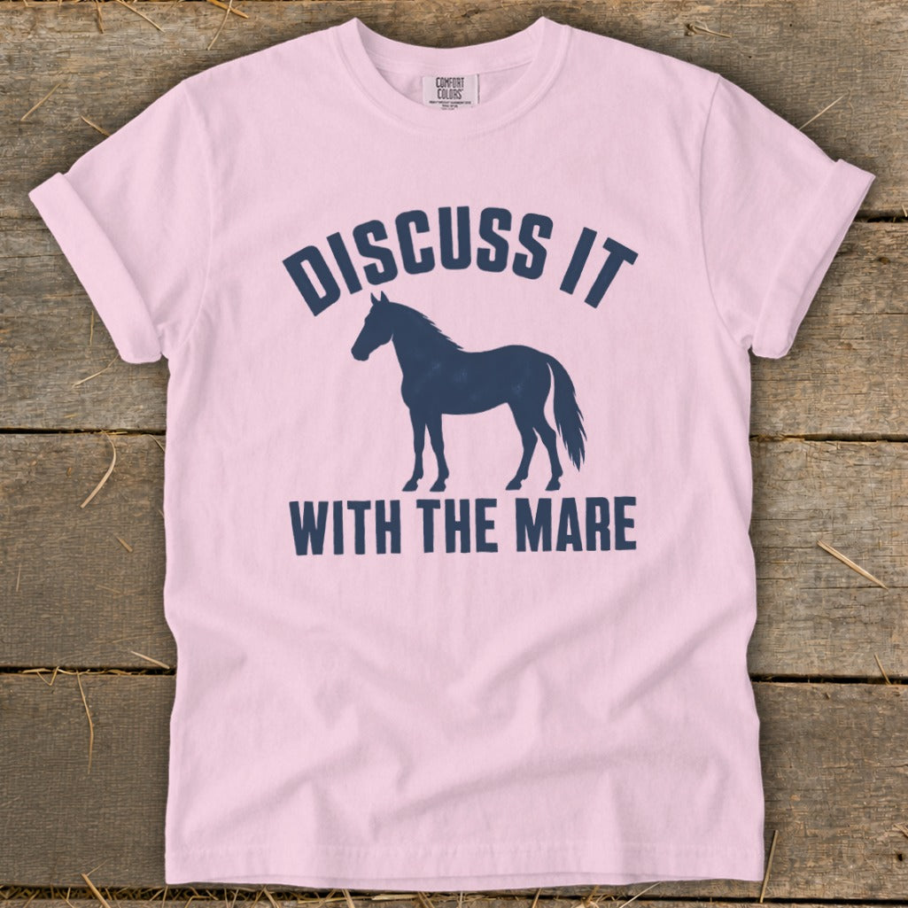 Pink t-shirt with navy graphic of horse and text "DISCUSS IT WITH THE MARE".