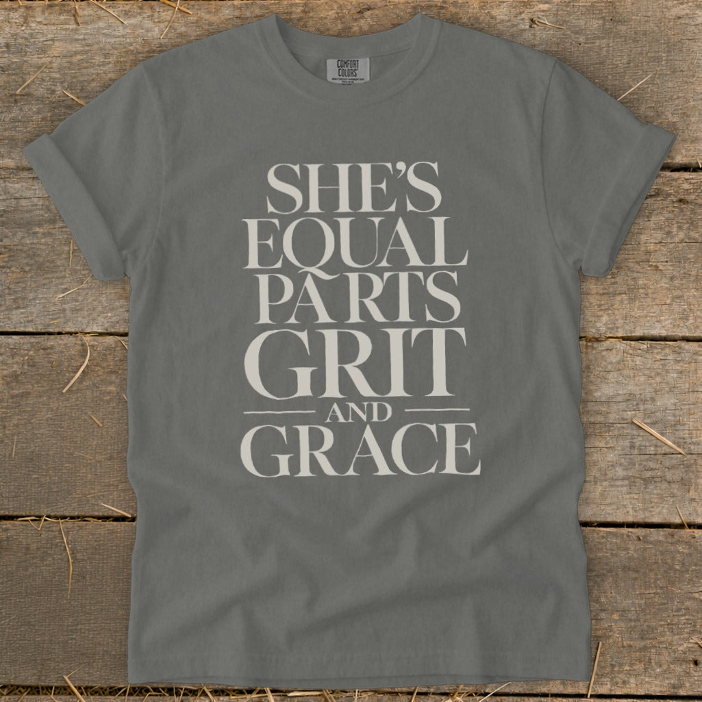 Grey t-shirt with "SHE'S EQUAL PARTS GRIT AND GRACE" text.