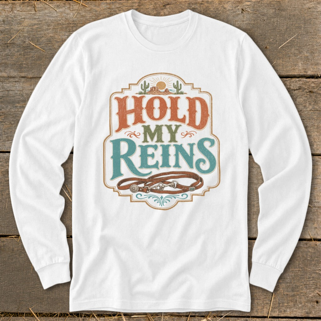 White long-sleeve shirt with "Hold My Reins" graphic and leather reins.