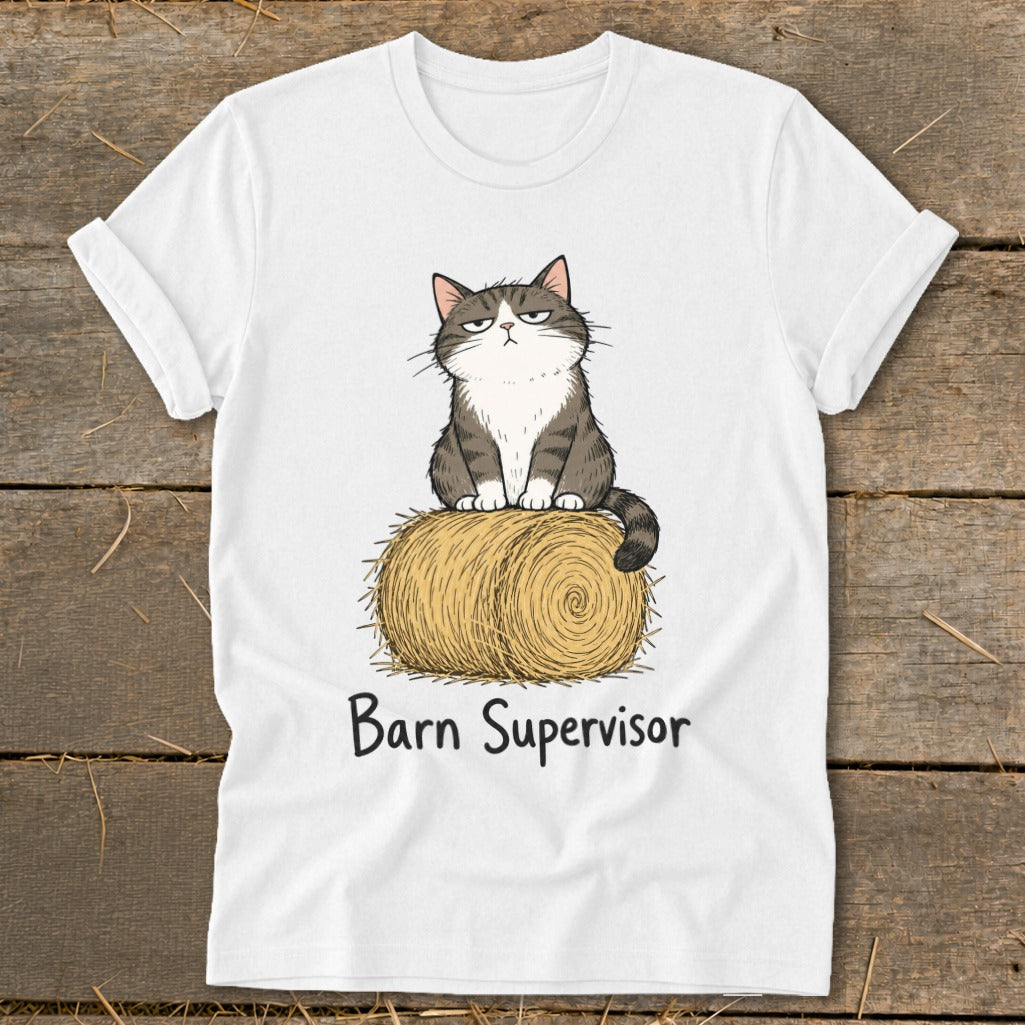 White t-shirt with grumpy cat sitting on a hay bale, saying "Barn Supervisor".