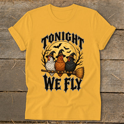 Three chickens in witch hats on a broomstick with "Tonight We Fly" text.