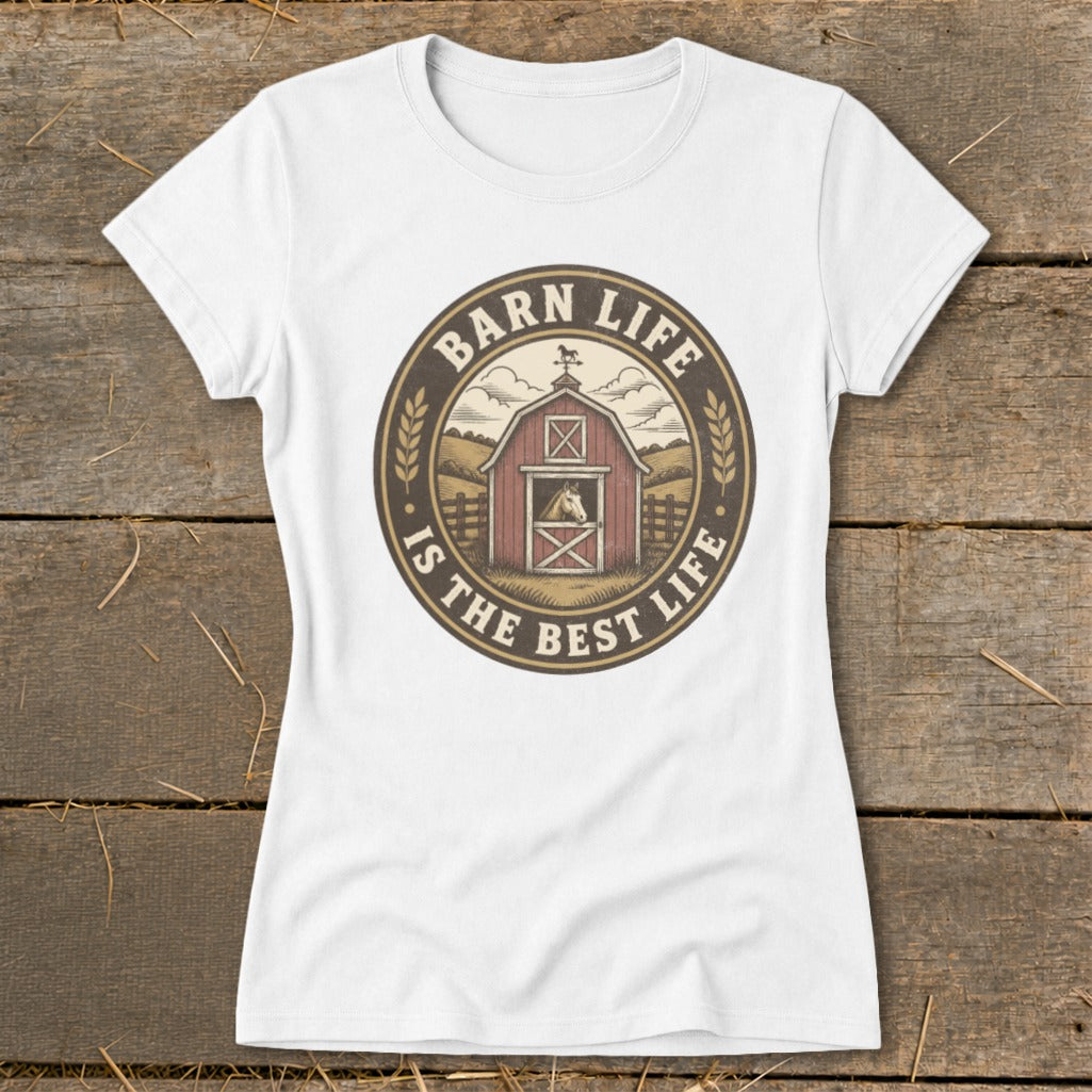 White t-shirt with a circular graphic featuring a red barn, horse, and text "Barn life is the best life."