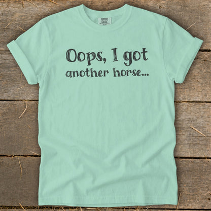 Mint Comfort Colors t-shirt with black text: Oops, I got another horse...