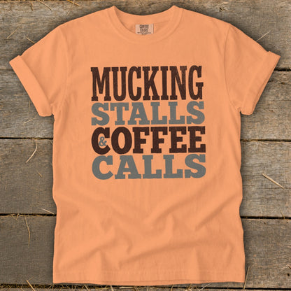 Peach t-shirt with "MUCKING STALLS & COFFEE CALLS" text.
