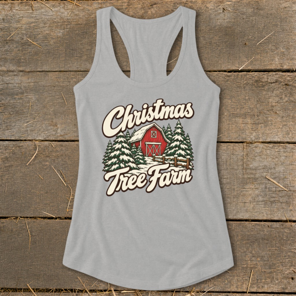 Gray tank top with "Christmas Tree Farm" text and a snowy red barn and trees graphic.