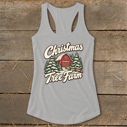 Gray tank top with "Christmas Tree Farm" text and a snowy red barn and trees graphic.