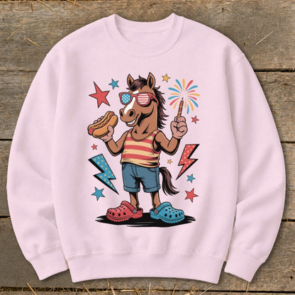 Horse wearing sunglasses and holding a hot dog and sparkler, with fireworks and lightning bolts.
