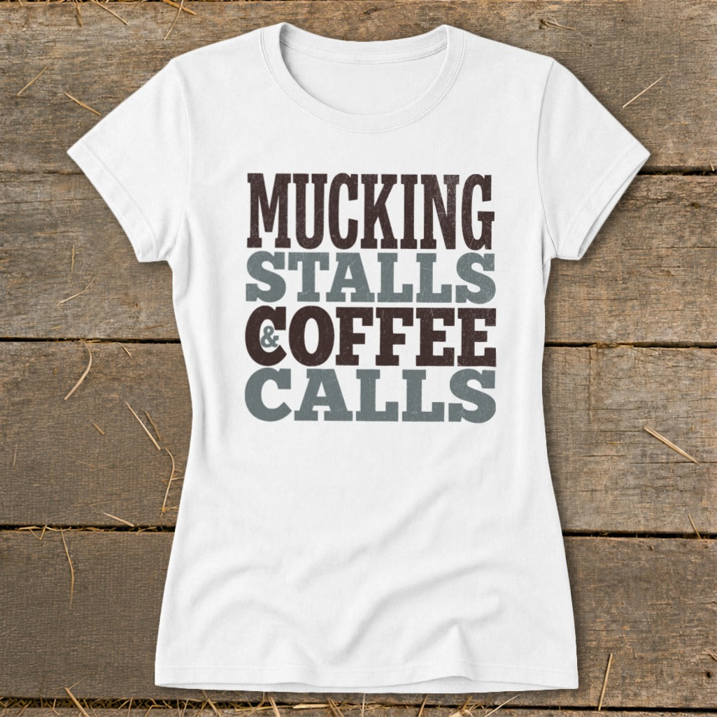 White t-shirt with "Mucking Stalls Coffee Calls" text in brown and grey.