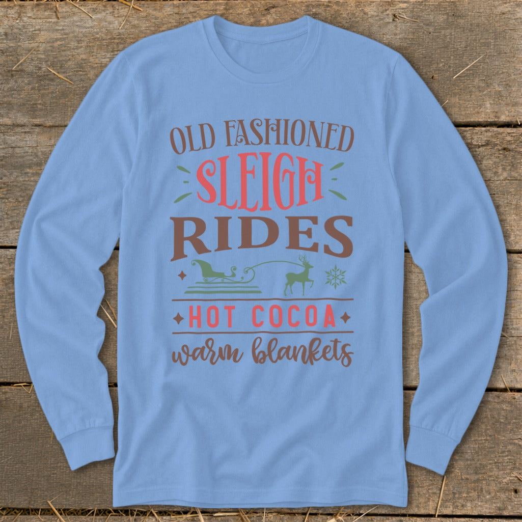 Light blue long sleeve shirt with "Old Fashioned Sleigh Rides" and graphics.