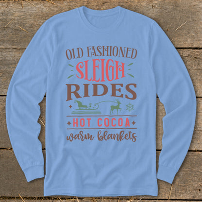 Light blue long sleeve shirt with "Old Fashioned Sleigh Rides" and graphics.