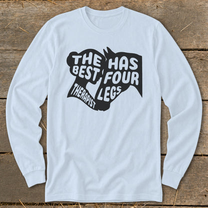 Light blue long sleeve t-shirt with black graphic "The best therapist has four legs".