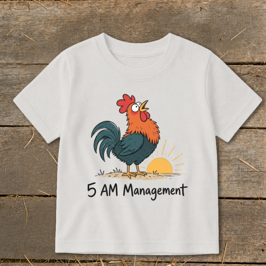 White t-shirt with cartoon rooster at sunrise and text "5 AM Management".
