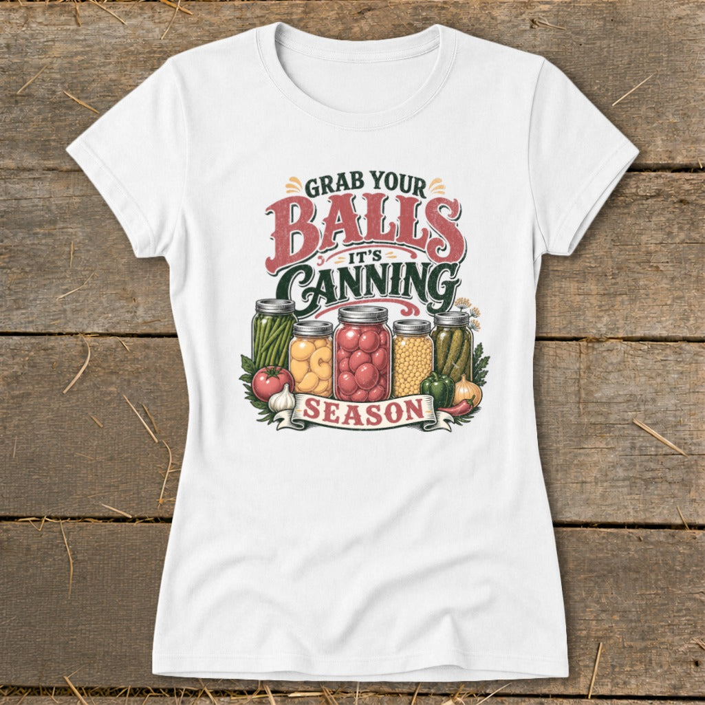 White t-shirt with text "Grab Your Balls It's Canning Season" and canning jars.