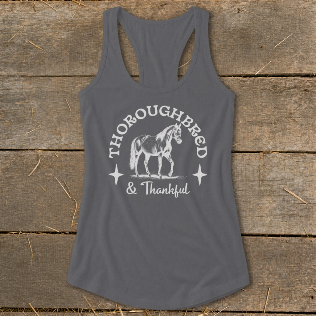 Thoroughbred & Thankful text with horse graphic on gray tank top.