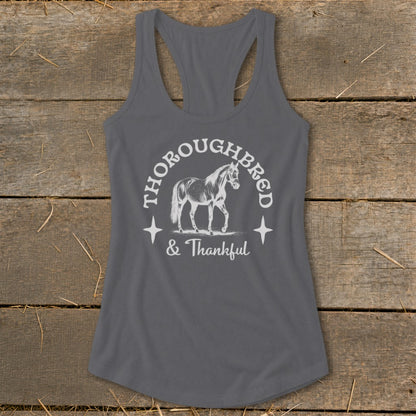 Thoroughbred & Thankful text with horse graphic on gray tank top.