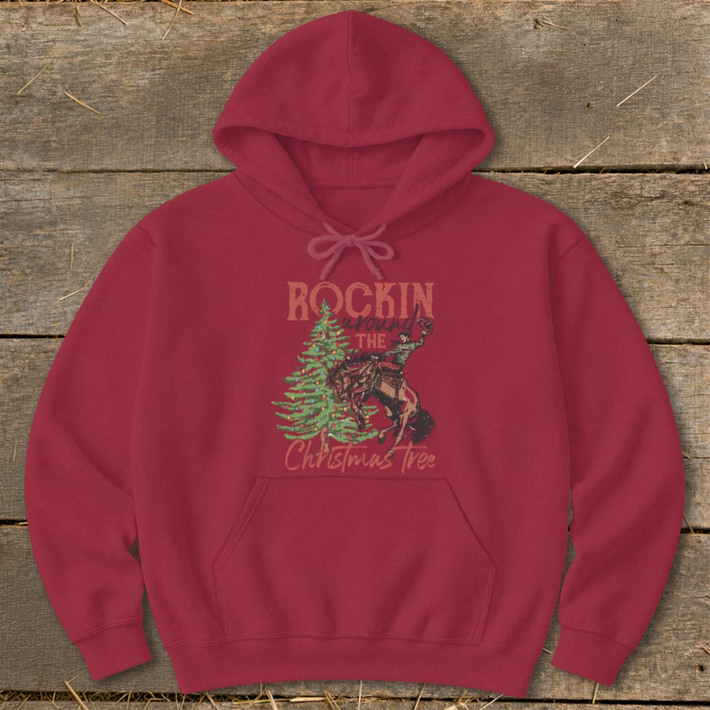 Maroon hoodie with "Rockin Around The Christmas Tree" graphic of a cowboy on a bucking bronco.