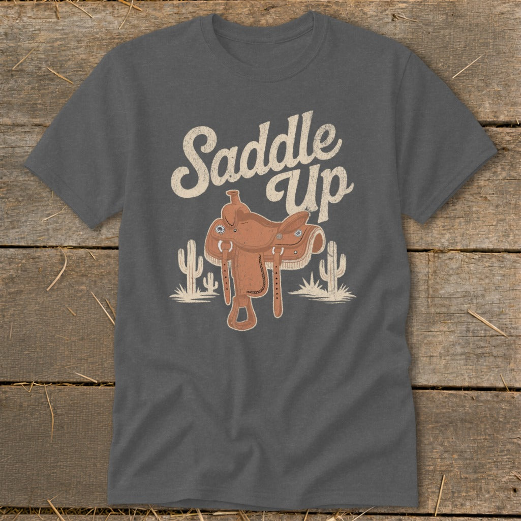 Dark grey t-shirt with "Saddle Up" text, saddle, and cacti graphic.