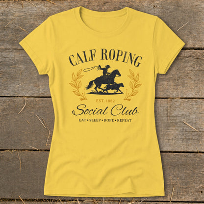 Yellow t-shirt with "Calf Roping Social Club Est. 1882" graphic.