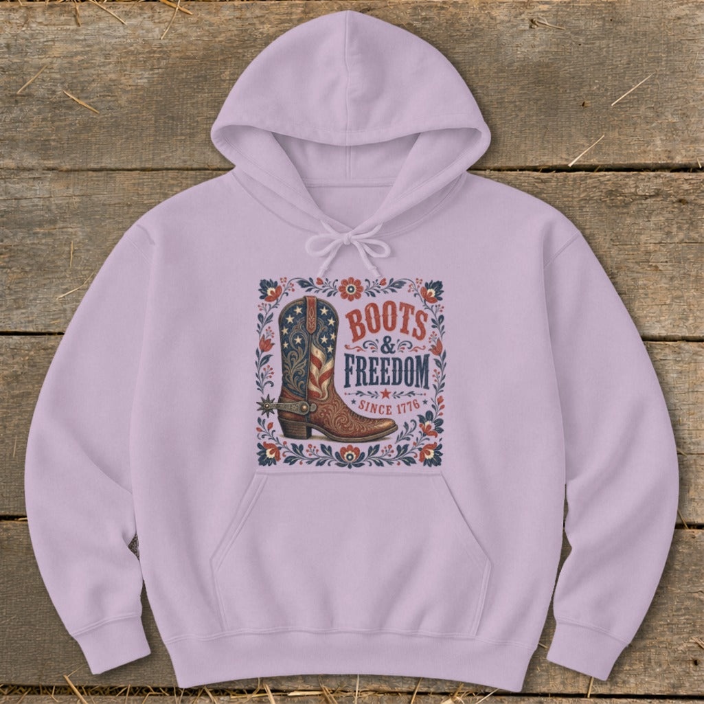 Lavender hoodie with "Boots & Freedom Since 1776" graphic featuring a cowboy boot.