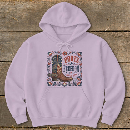 Lavender hoodie with "Boots & Freedom Since 1776" graphic featuring a cowboy boot.