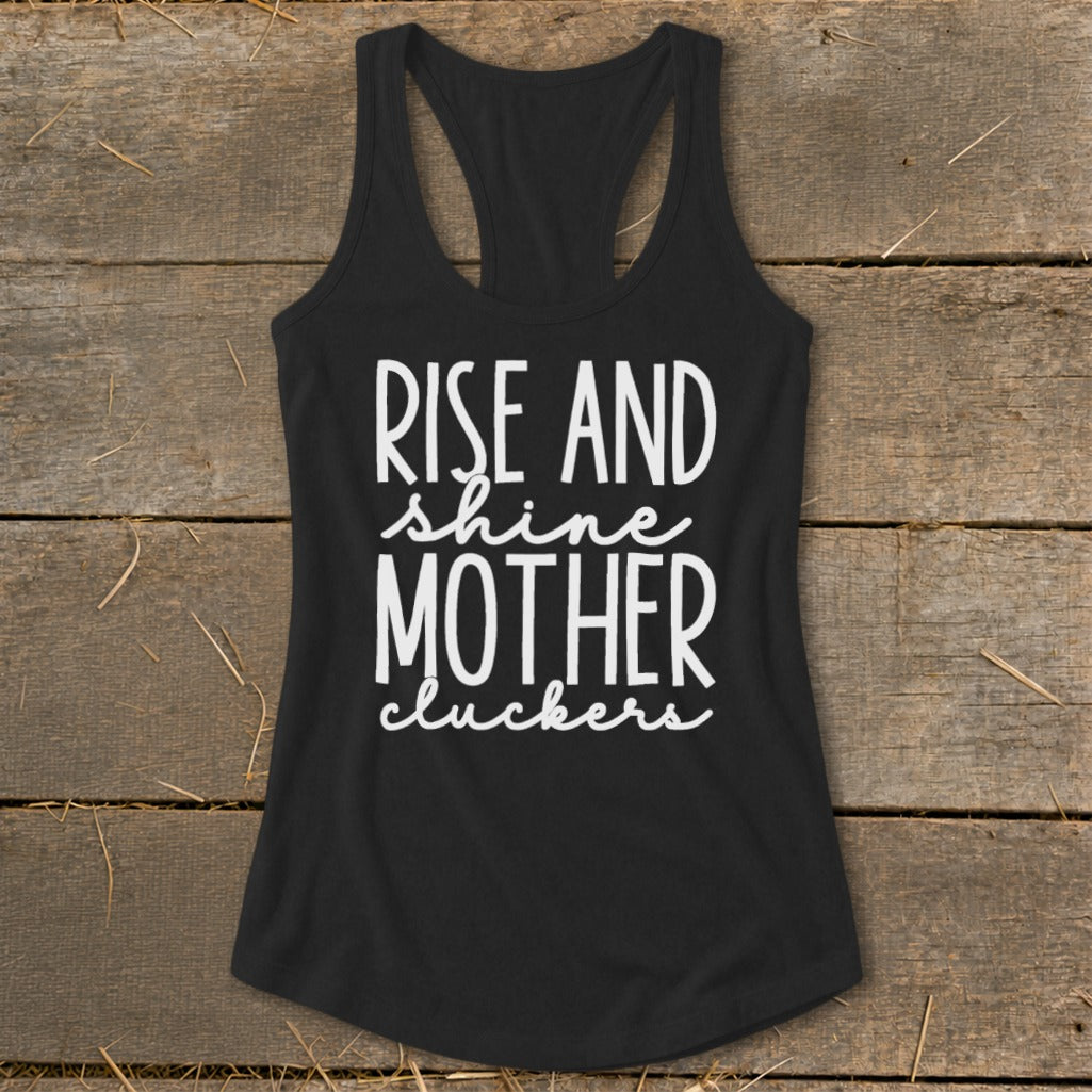 Black tank top with white text "Rise and shine mother cluckers."