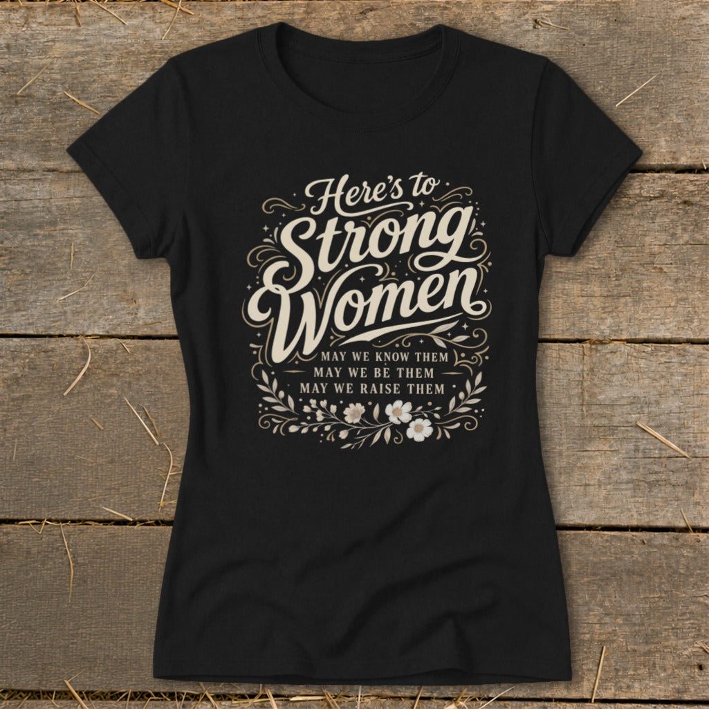 Black t-shirt with "Here's to Strong Women" and floral design.