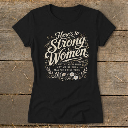 Black t-shirt with "Here's to Strong Women" and floral design.