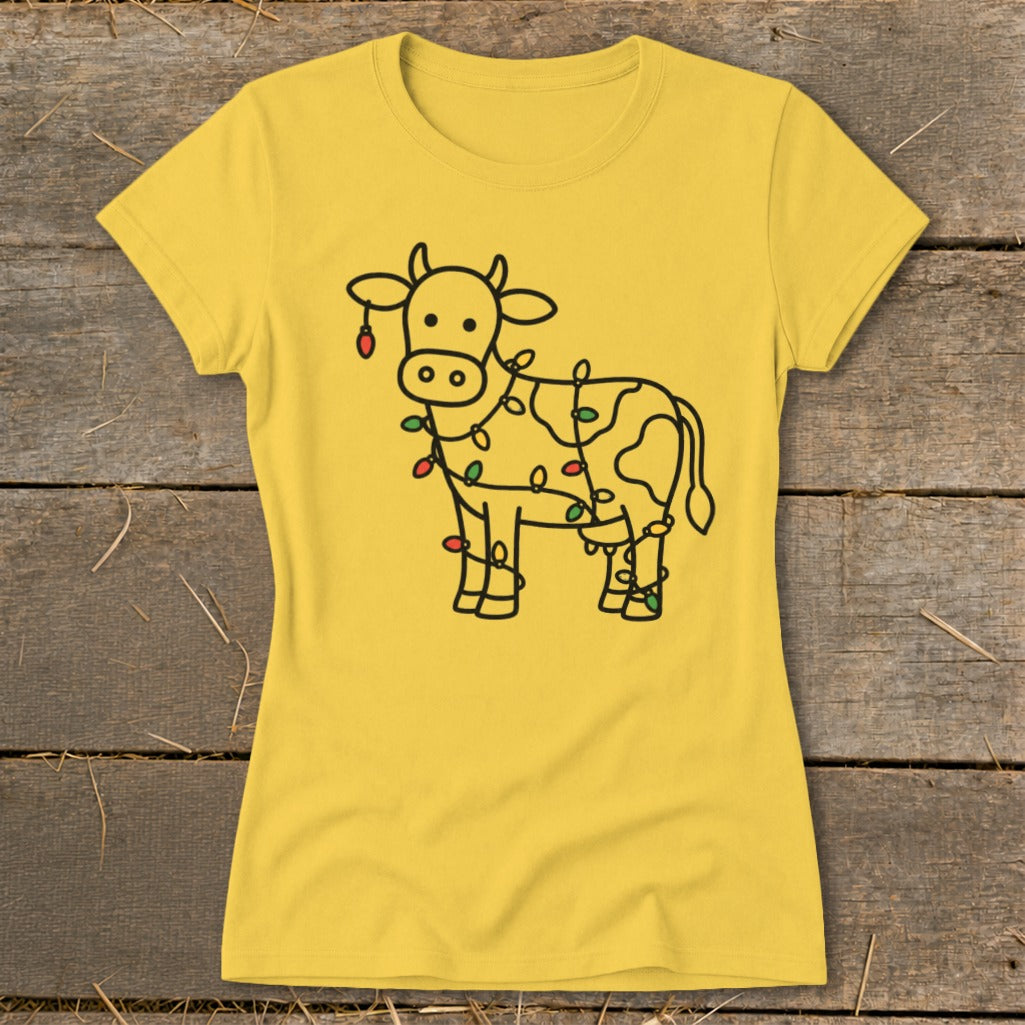Yellow t-shirt with a black line drawing of a cow wrapped in colorful Christmas lights.