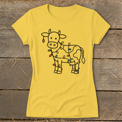 Yellow t-shirt with a black line drawing of a cow wrapped in colorful Christmas lights.