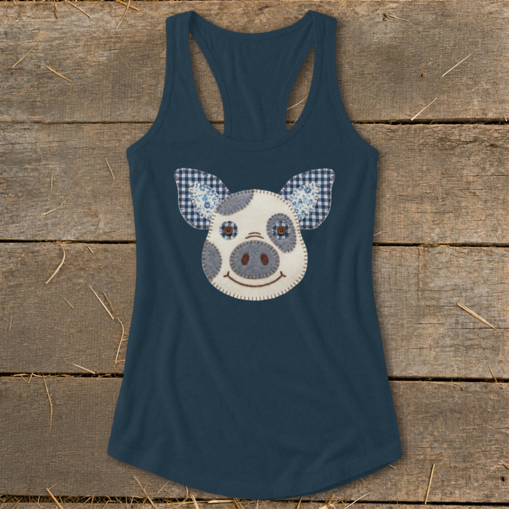 Dark blue racerback tank top with a patched pig face design.