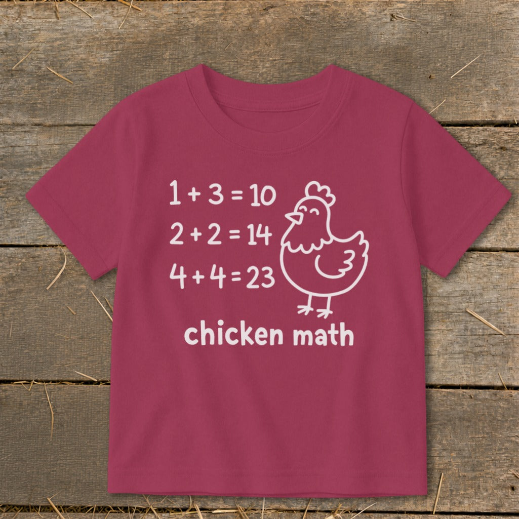 Pink t-shirt with white text and chicken graphic: "chicken math".