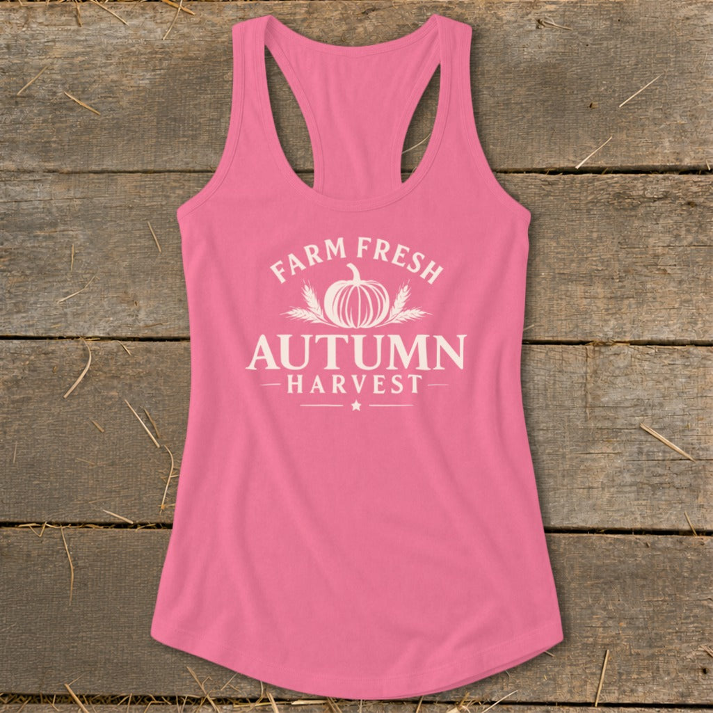 Pink tank top with white "Farm Fresh Autumn Harvest" text and pumpkin graphic.