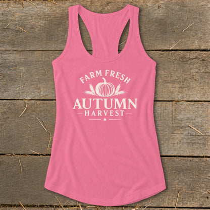 Pink tank top with white "Farm Fresh Autumn Harvest" text and pumpkin graphic.
