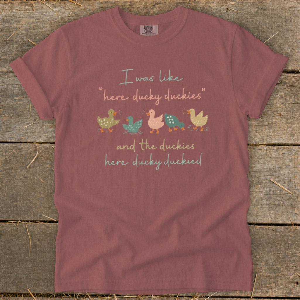 T-shirt with "I was like 'here ducky duckies' and the duckies here ducky duckied" and ducks.