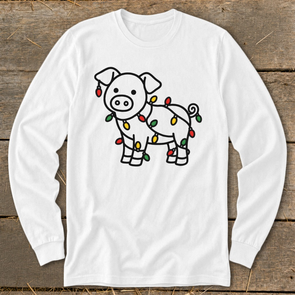 White long-sleeve t-shirt featuring a line drawing of a pig tangled in colorful Christmas lights.