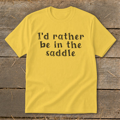 Yellow t-shirt with black text that reads "I'd rather be in the saddle".