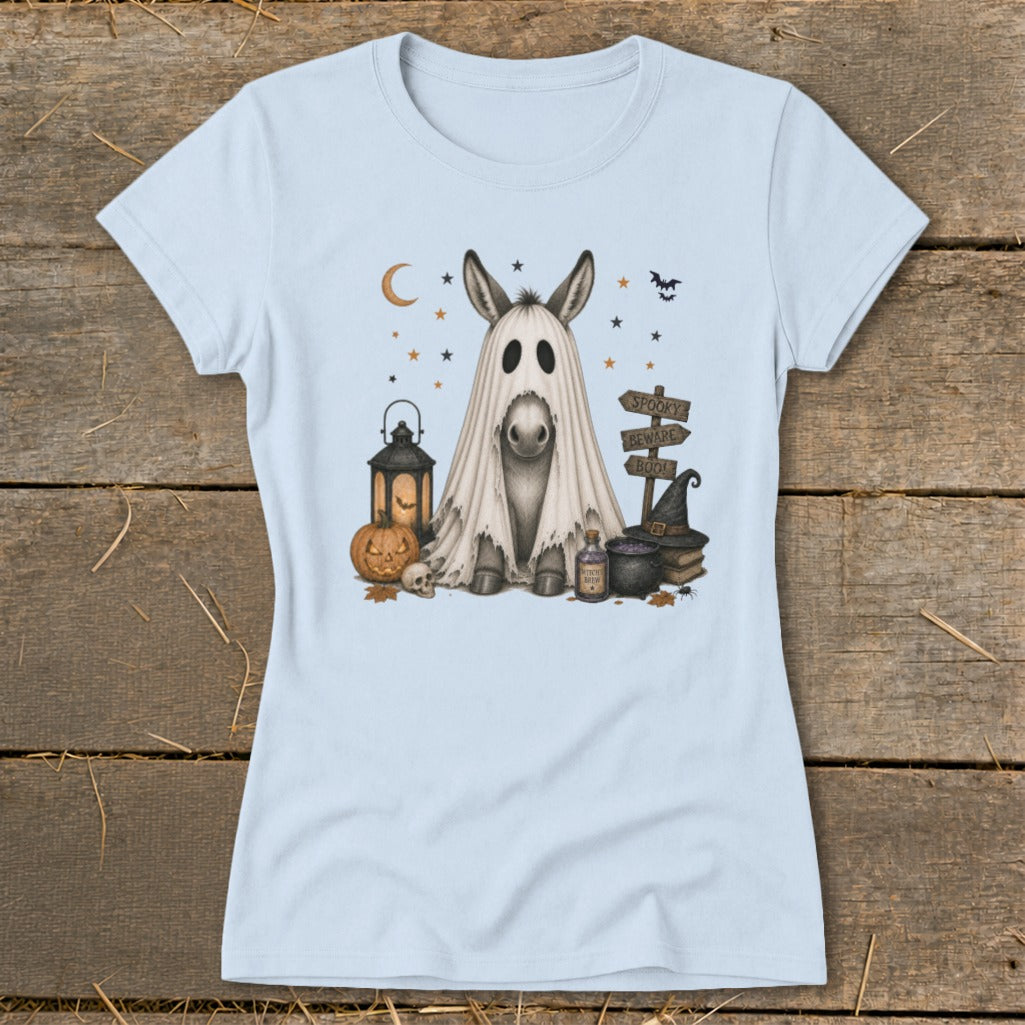 Donkey wearing a ghost costume with Halloween decorations, including a pumpkin and potion.