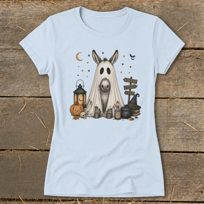 Donkey wearing a ghost costume with Halloween decorations, including a pumpkin and potion.