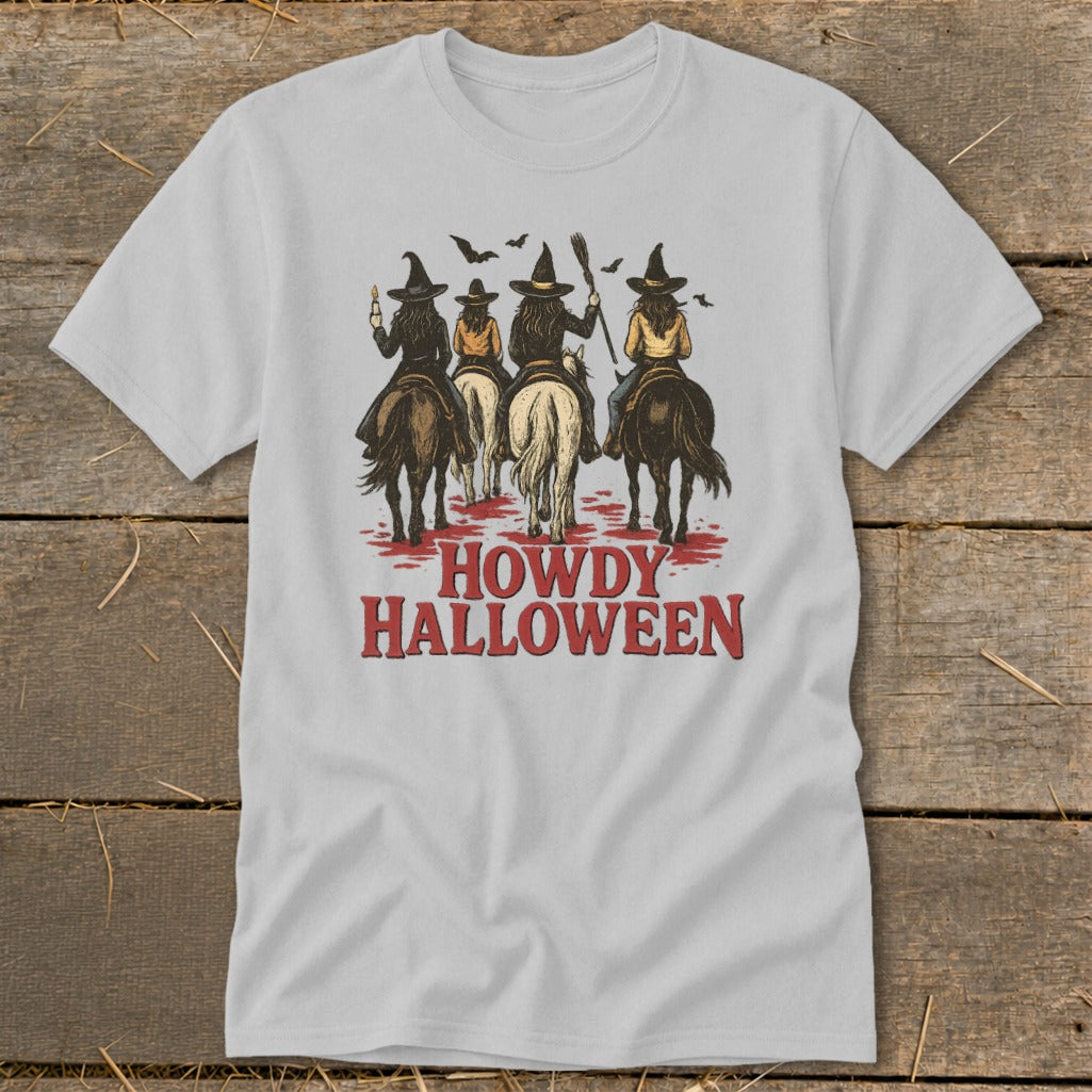 Four witches on horseback with broomsticks and bats above text "Howdy Halloween."