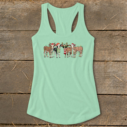 Mint green tank top with Christmas cows wearing Santa hats and holiday lights.