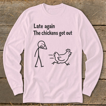 Pink long-sleeved shirt with text "Late again The chickens got out" and a stick figure chasing a chicken.