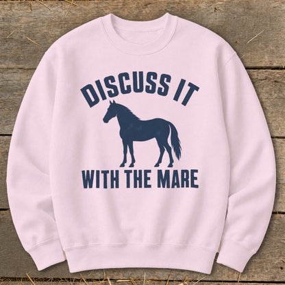 Pink sweatshirt with navy blue horse silhouette and text "Discuss It With The Mare".