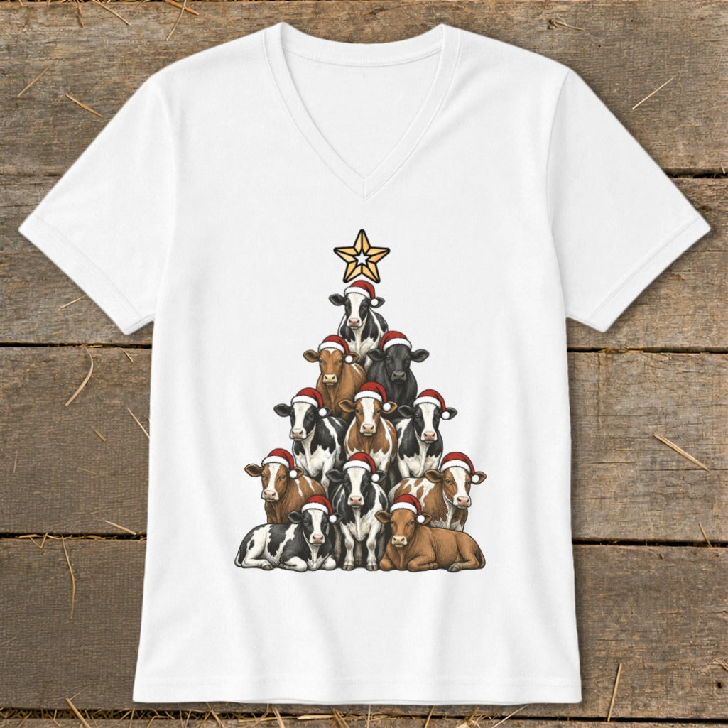 Christmas tree made of cows wearing Santa hats, topped with a star.