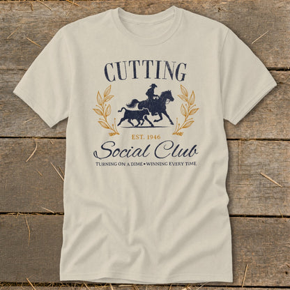 Cream t-shirt with "Cutting Social Club" and horse and calf graphic.